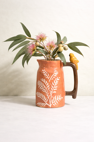 Fern jug with bird in ochre